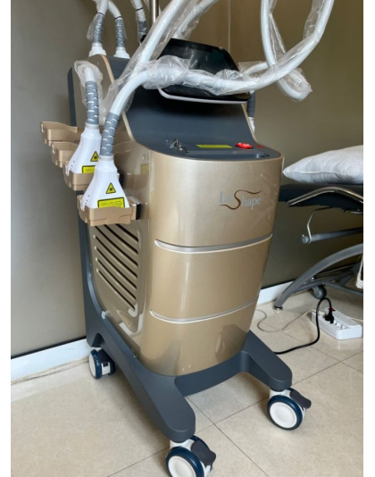 Close-up of LeShape 1060nm diode laser applicator handpiece with sapphire crystal optical guide