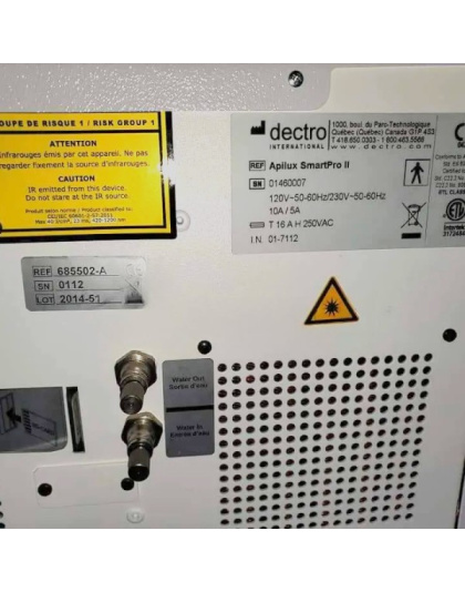 Close-up shot of the Apilux SmartPro IPL II emitting intense pulsed light, highlighting the technology behind effective hair removal.