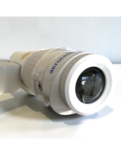 Close-up of Aerolase Era Erbium handheld laser tip delivering precise fractional ablation for skin rejuvenation.