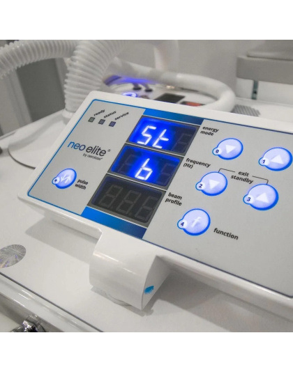 Close-up of Aerolase Lightpod Neo Elite handheld laser applicator in use during skin rejuvenation procedure.